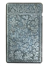 Vintage Zaima C-10 Electronic Pocket Silver Gas Lighter w Raised Leaf Decoration picture