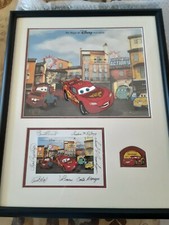 Signed Disney Cel Ka-Chow With Photo And Pin. With certificate of authenticity picture