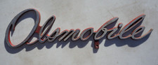 OLDSMOBILE License Plate TOPPER GM Factory Dealer SHOWROOM Attachment Booster picture