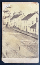 CDV of street scene, unknown town, with small animal picture