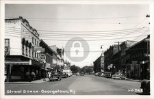 Downtown Georgetown Street Scene w/ Cars Businesses KY Cline RPPC Postcard COPY picture
