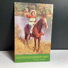 VINTAGE OHIO POSTCARD “CASHALONG HAPPILY” COWGIRL ON HORSE WITH CASH  picture