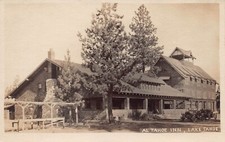 RPPC Lake Al Tahoe CA Inn Hotel Gas Station LH Bannister Photo Postcard D48 picture