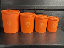 A Set Of Vintage Tupperware Servalier Orange Nesting Canister Set With Lids picture