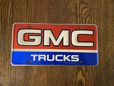 Original GMC Trucks Booster License Plate - Great Condition picture