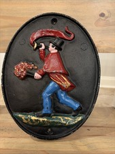 VINTAGE FIREFIGHTER BLOWING HORN CAST IRON FIRE MARK PLAQUE picture