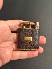 Vintage Golden Wheel Lighter picture