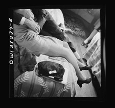 Photo:1930s 1940s Women Legs Shoes Sitting Indoors Fashion Snapshot picture