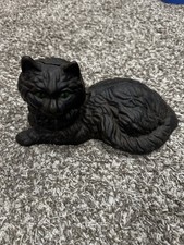 Vtg Hubley-style cast iron lounging black cat doorstop with painted green eyes picture