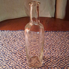 vintage clear bottle, no chips or cracks.  unmarked.  picture