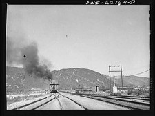 Photo:Railroad Tracks Mountain Smoke Steam Locomotive 1900s picture