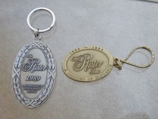 2 - Vintage Hotel Keychain Pfister MILWAUKEE WI 1893-1993 & 1989 picture