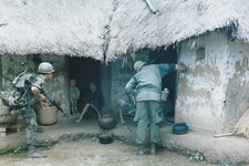 Vietnam War Photos -- Soldiers Seaching Village For Viet Cong picture