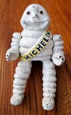 VINTAGE MICHELIN MAN MOTORCYCLIST (BIBENDUM) CAST IRON picture