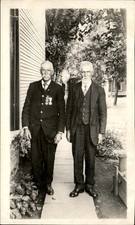 Two elderly men in suits CIVIL WAR VETERANS MEDALS c1910 Real Photo Postcard bhn picture