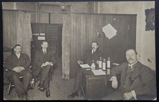 Antique RPPC Men in Office Interior Early 1900s Bottles Desk Scene AZO Back picture