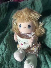 The twelfth item is a vintage 1989 Precious Moments 