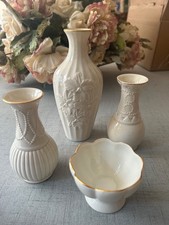 4 Lenox items:  3 Lenox bud vases, 1 compote.  Ivory with gold accents. picture