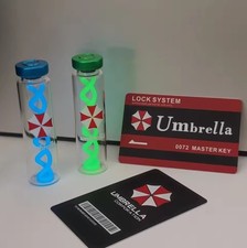 2 Pack Resident Evil T-Virus Glow In Dark W/ Umbrella Corp Key Card vial prop picture