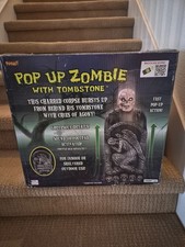 SPIRIT HALLOWEEN POP UP ZOMBIE NEW IN BOX  RARE 2014 ANIMATED. picture