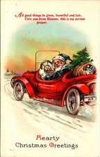 Vintage  Santa Claus Racing in an Antique Car & Toy Bag Christmas Postcard picture