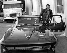 STEVE McQUEEN GETTING INTO HIS 1966 CORVETTE STINGRAY - 8X10 PHOTO (AA-653) picture