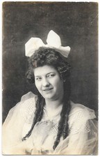 RPPC c1910s Studio Portrait Young Woman Big Bow Curls Real Photo Postcard picture