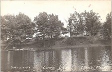 RPPC Irons Michigan Long Lake Smitty's Cabins Shoreline View 1950s era picture