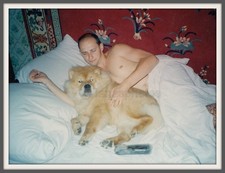 Sweet couple lying Bed Cute dog Chow Chow Handsome man shirtless photo Gay Int picture