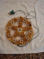Vintage Noma Christmas tree topper. Gold tinsel light picture