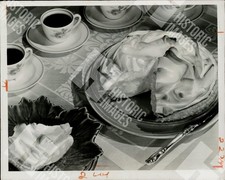 1950 Historic press photograph showing a lemon meringue pie served with coffee picture