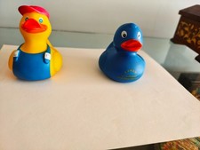lufthansa first class duck  2 ducks, 1 worker duck with blue apron, 1 blue duck picture