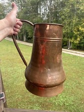 vintage or antique hand-hammered copper jug or pitcher picture