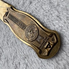 Vintage 1920s Moor Mud Baths Brass Letter Opener Waukesha WI Spa Advertising picture