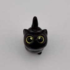 Adorable Tiny Black Wood Cat With Yellow Eyes Desk picture