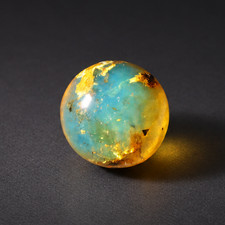 Natural orange blue Dominican amber sphere/ball 19.3mm picture