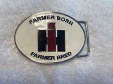 VTG NIP IH International Harvester Belt Buckle Enamel Finish Farmer Born Bred picture
