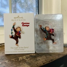 2012 Hallmark Keepsake Curious George Ornament “The Light Of The Party” picture