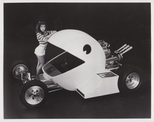 1983 Press Photo Leggy Model Poses with Pac-Man Hot Rod at Houston Autorama picture
