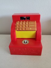 Vintage Mechanical Red Wind Up Cash Register Bank with Hand Snatching Action picture