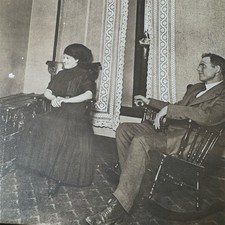 Antique RPPC Postcard Flag Victorian Parlor Interior Seated Couple Unposted picture