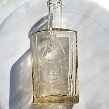 Clear Embossed Glass Medicine Bottle, Rectangular Flask Style picture