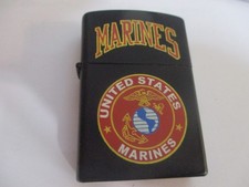 VINTAGE MARINES  TOBACCO BLACK LIGHTER .  MAY NEED SERVICE TO WORK.  VGC picture
