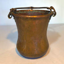 Antique Hand Hammered Copper Cauldron Featuring A Forged Iron Swing Handle picture