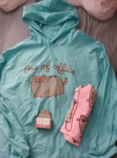 Pusheen Items From Spring 2019 Box Poncho Yoga Towel Day Block Calendar picture