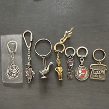 Lot of 7 Modern Advertising Metal Keychains w/ Detachable Keyring picture