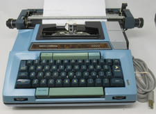VINTAGE SMITH CORONA CORONAMATIC 2200 BLUE ELECTRIC TYPEWRITER W/BRWN CASE, RARE picture