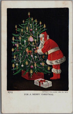 Santa Claus with Tree~Antique 1907 Christmas Postcard~Ullman Publ.~s492 picture