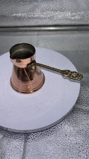 A vintage Copper scoop/measure picture