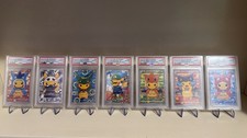 Lot of 7 Cards Pokemon Custom Display Slab - Pikachu Luigi / Team Skull / Poncho picture